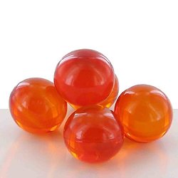 Perle de bain parfumée Abricot ronde en orange translucide