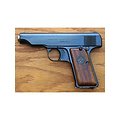 plaquettes / grips  pistolet ORGIE modele 1920 ( avec securité tres rare )