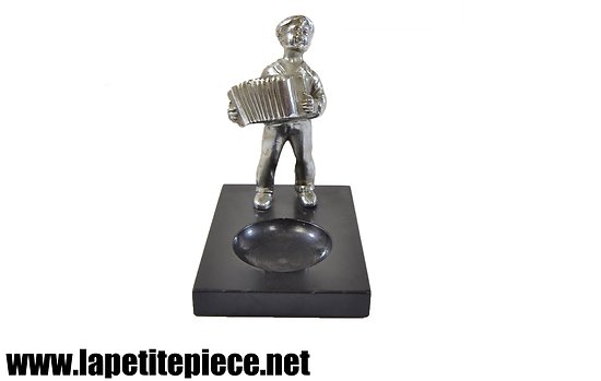 Statuette garçon à l'accordéon en régule sur socle de marbre. Vide poche.
