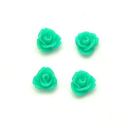 4 petites fleurs en résine vertes pour bijoux ou scrapbooking 7mm