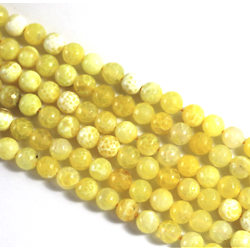 Perle d'agate jaune craquelée / veinée et à facettes 14mm