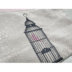 Pochette brodée cage à oiseau en simili cuir rose clair et suédine écrue