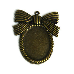 Support de pendentif noeud pour cabochon ovale en métal couleur bronze 46x39mm