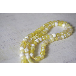 10 petites perles à facettes en agate et onyx blanc/jaune 4mm