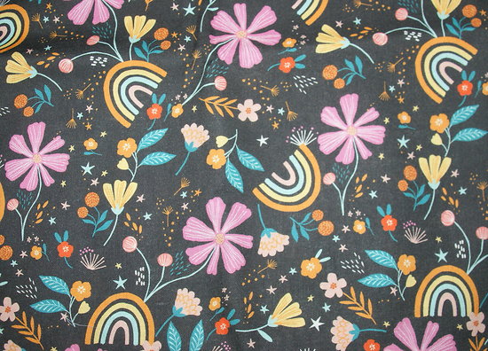 Coton fleuri avec arcs-en-ciel multicolores, fond noir