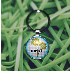 Porte-clef MERCI aux fleurs vertes et métal  argenté et verre