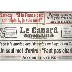 LE CANARD ENCHAINE n°4748 26/10/2011  La montée des islamistes en Libye et en Tunisie/ Sarkozy et le triple A